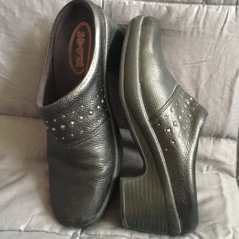 Black leather clogs